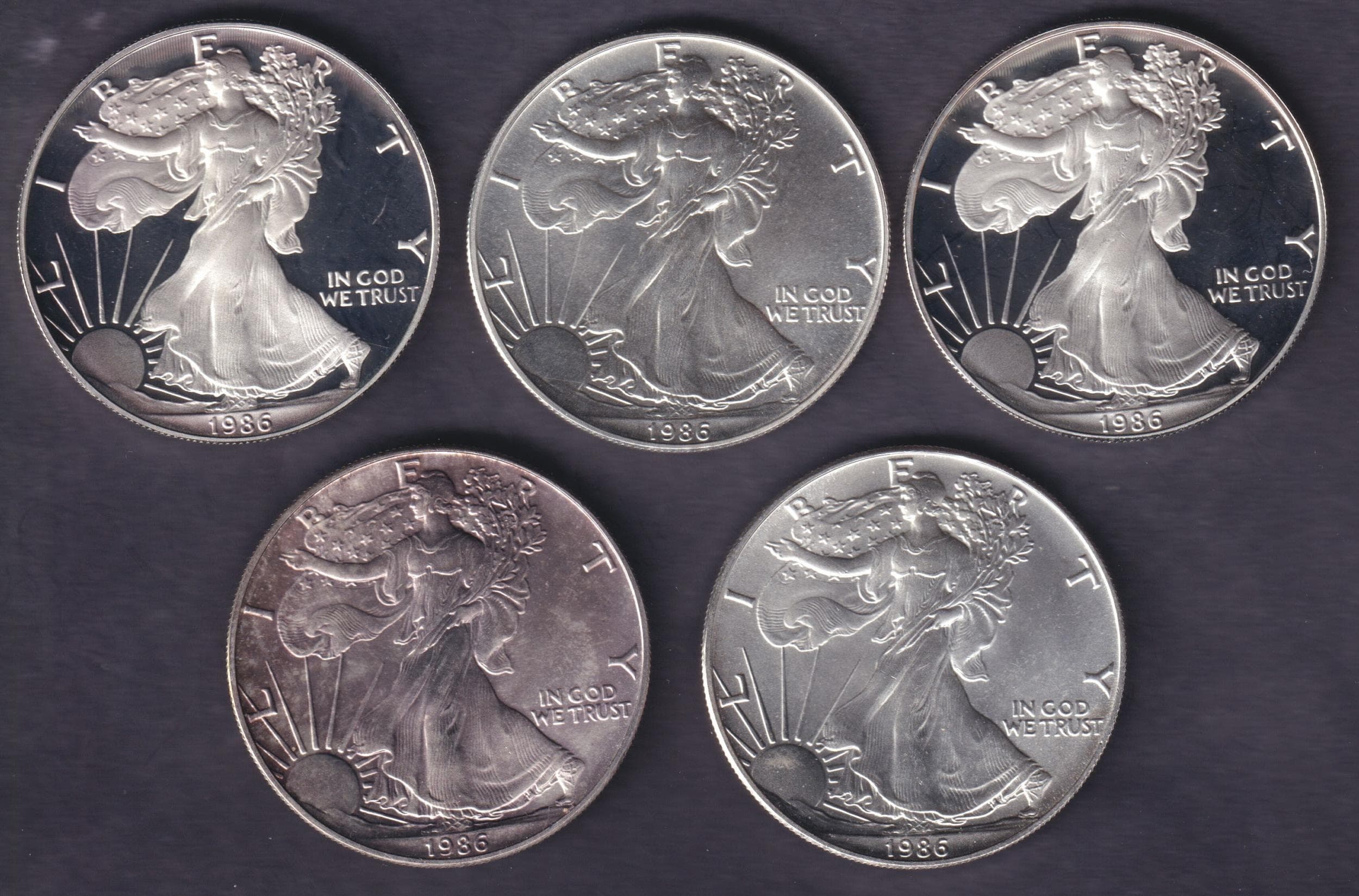 Gold sovereigns, silver coins, and coin albums open for expert valuation